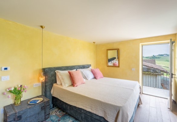 View over the gentle Monferrato hills from the window of double bedroom n. 6 - Tenuta Schiavon Barrero