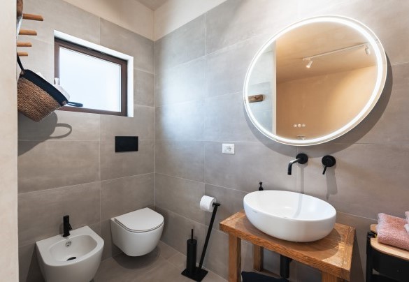 Il bagno en-suite con doccia n.2 - Trulli Fiori di Mandorlo		