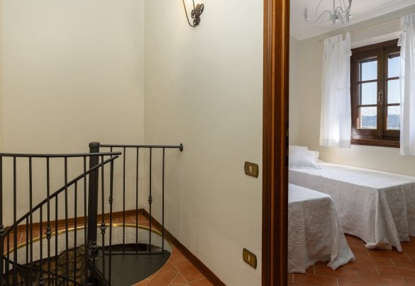 The spiral staircase which leads up to the sleeping area – Villa Loredana