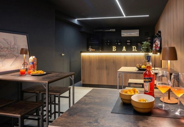 Area living al piano interrato - Villa Oxa 