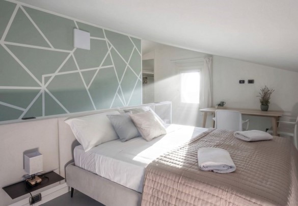 Camera matrimoniale con letto singolo aggiunto n.6 al secondo piano  - Villa Oxa 