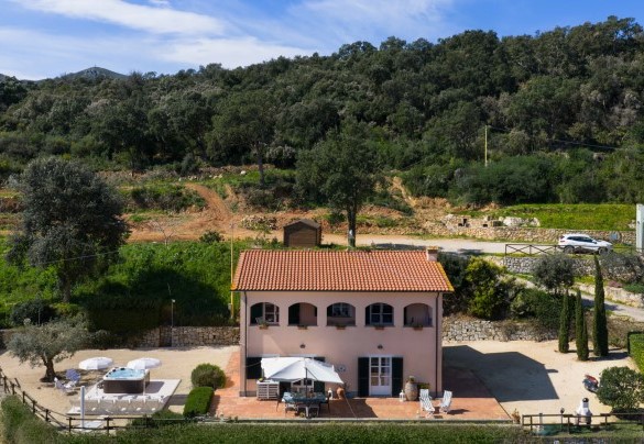 Aerial view of the villa nestled among the hills - Villa Perelle 