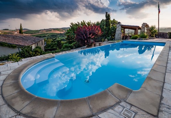 Pool and outdoor area at sunset – Villa Valgiorgia