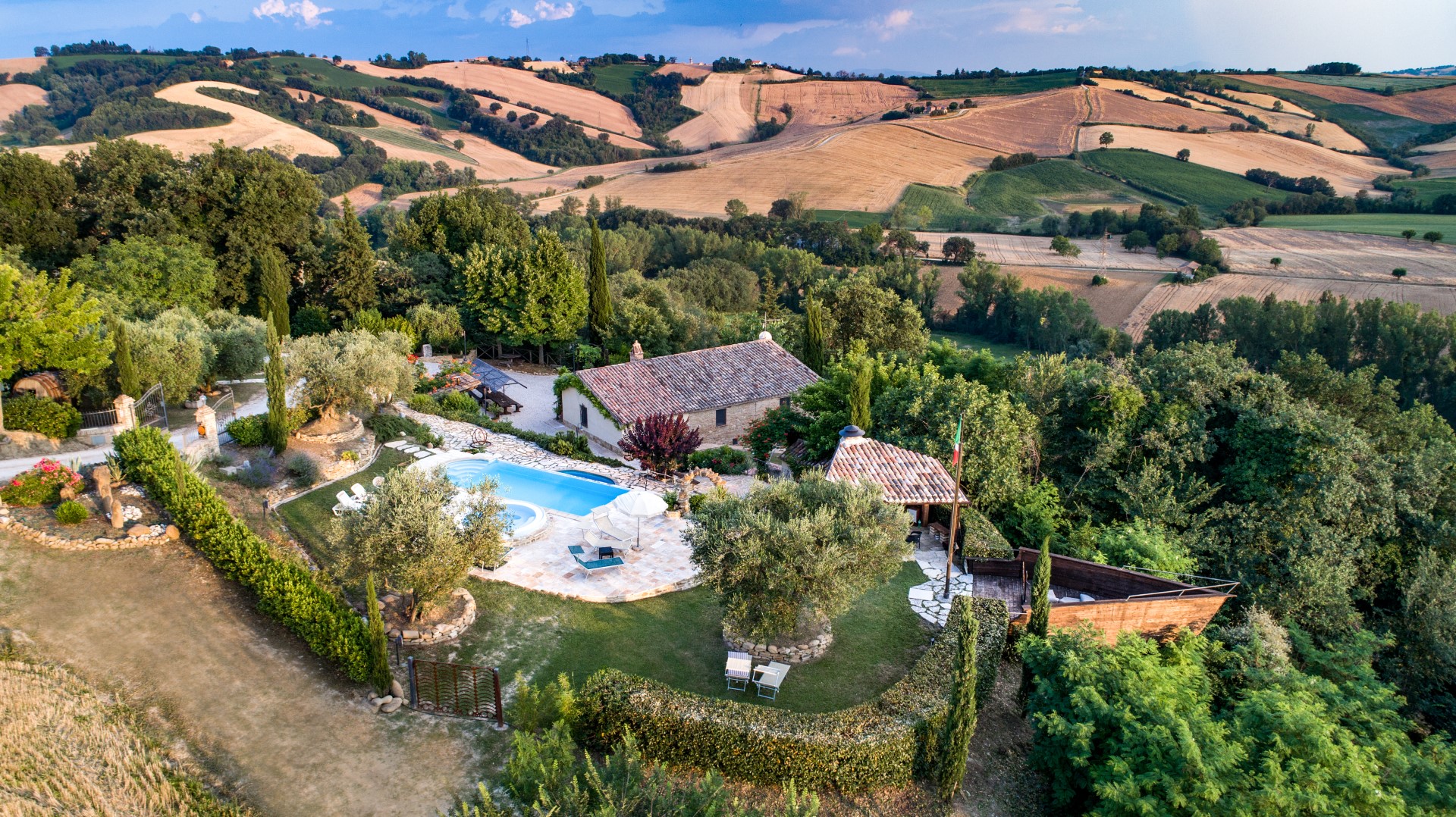 Aerial view of the villa surrounded by hills – Villa Valgiorgia